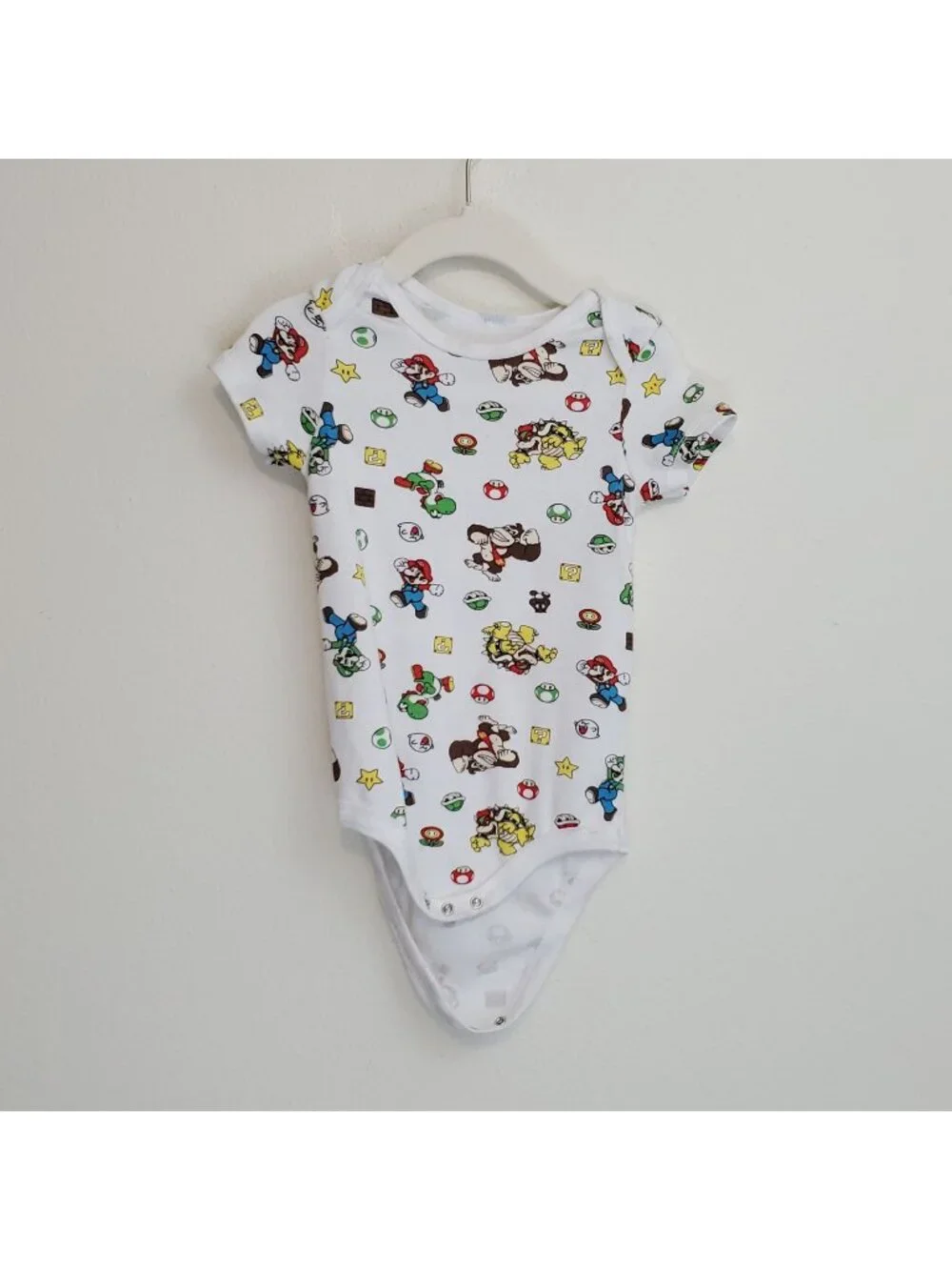 Super Mario Nintendo all-over-print baby onesie